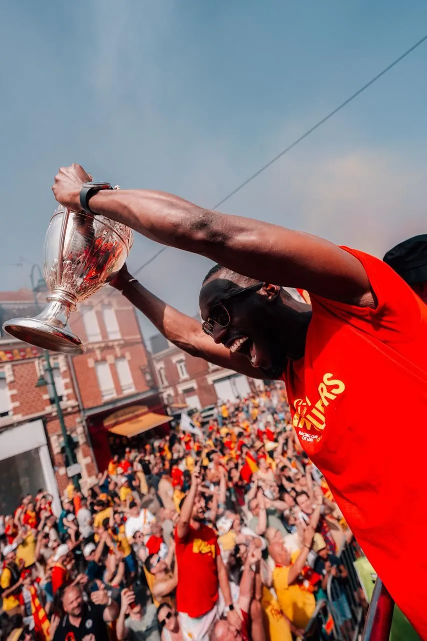 Abdallah Sima — trophy celebration